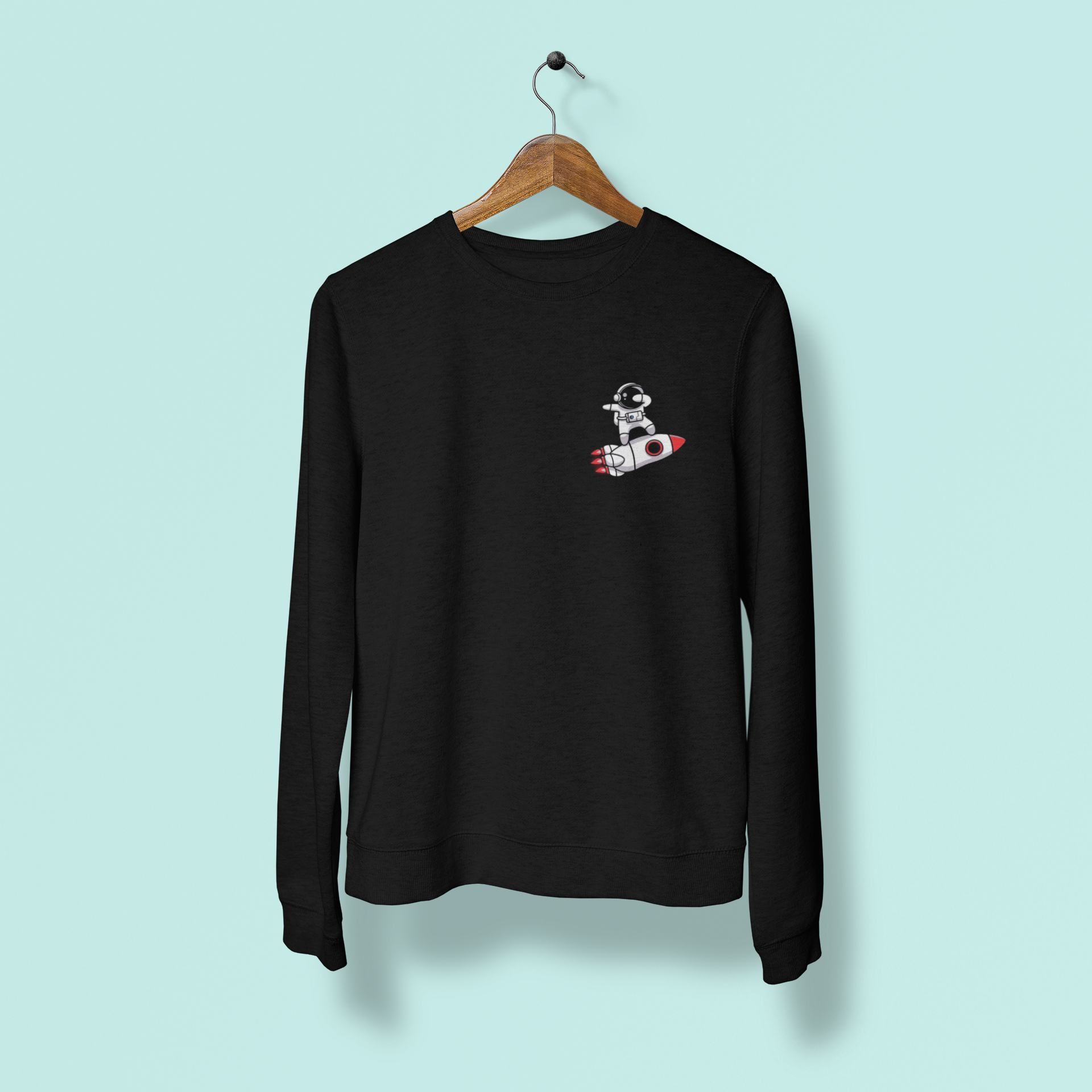 Miniatura de astronauta e foguete