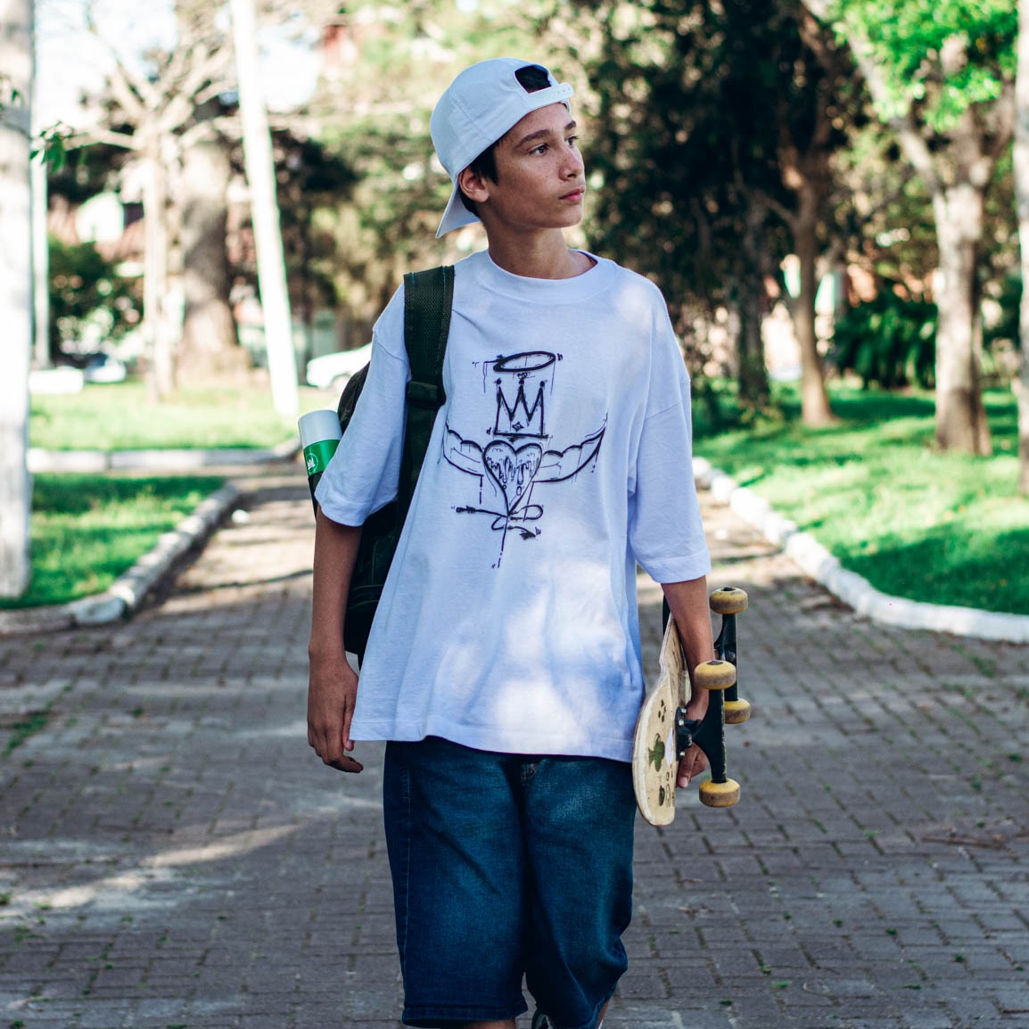 Camiseta Streetwear Oversized Grafite Street Skate e Bike Wheeling Roupa Undeground- Camiseta Larga Loose cut Corte Solto Winged Heart